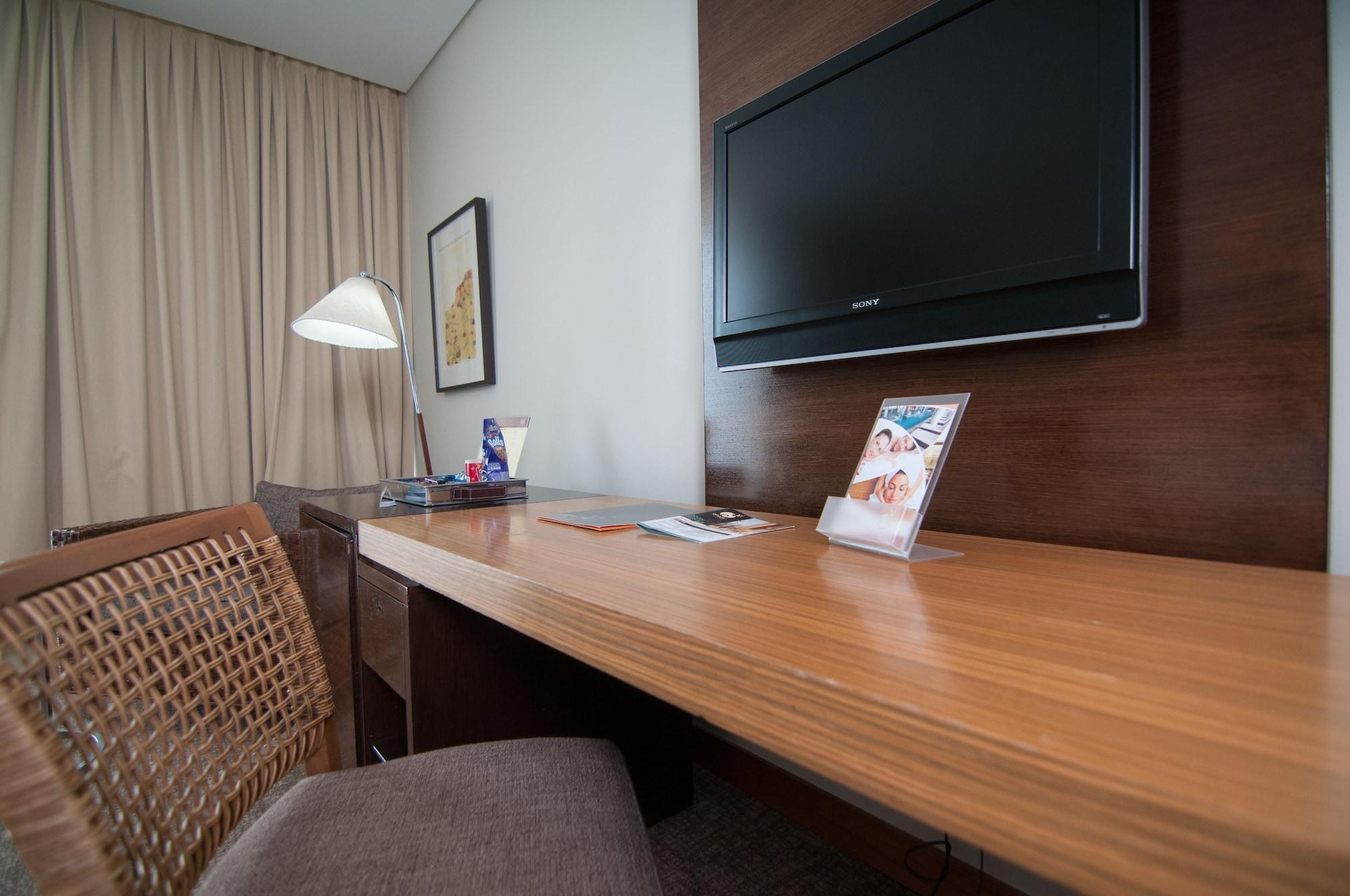 Enjoy Coquimbo Hotell Eksteriør bilde A television in a hotel room